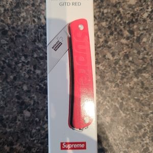 Supreme/Boker Glow in the Dark Keychain knife.